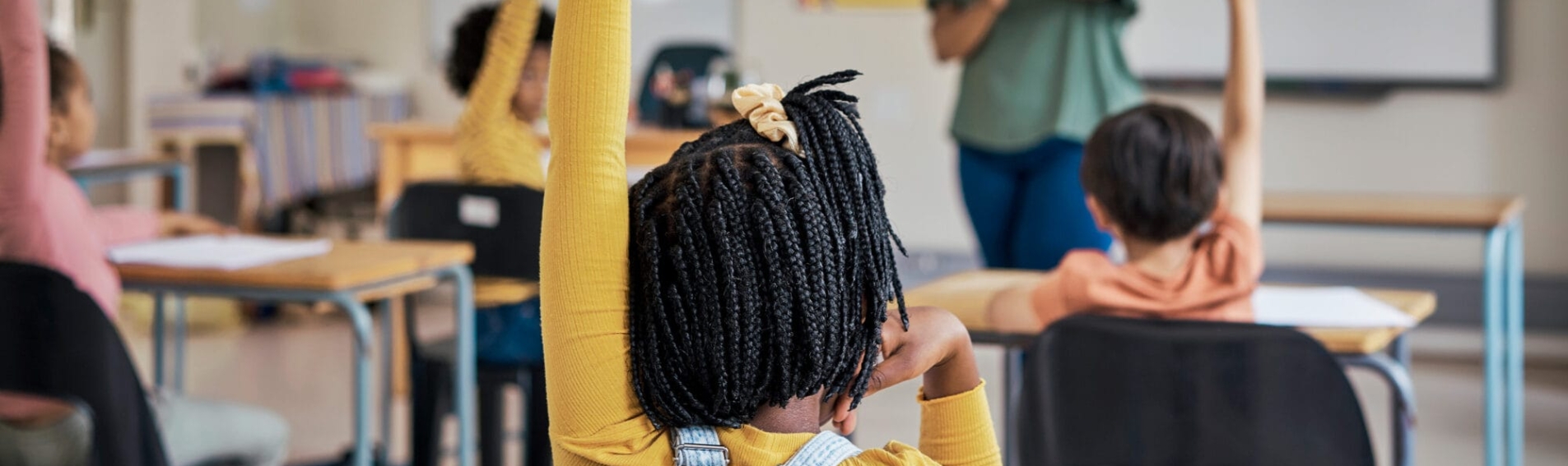 students raising hand