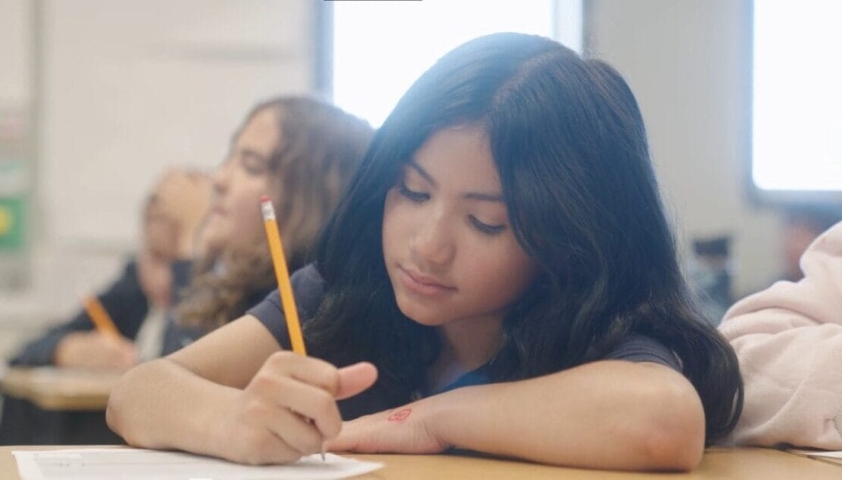 photo of girl writing