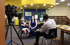 girl and her mom being interviewed