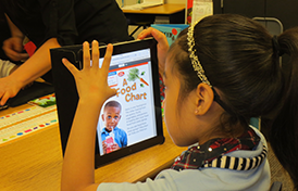 girl using ipad